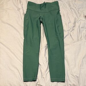 Athleta Interval Stash 7/8 Tight in Forest Green